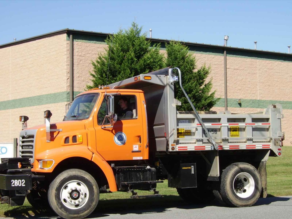 Dump Truck Trailer Truck Tarp systems by Cramaro Tarps