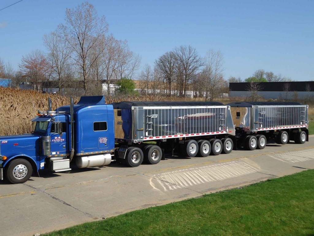 Dump Truck Trailer Truck Tarp systems by Cramaro Tarps