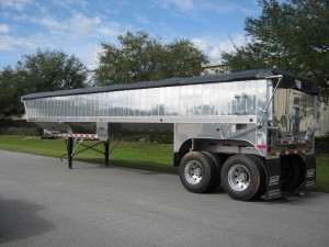 Dump Truck Trailer Truck Tarp systems by Cramaro Tarps